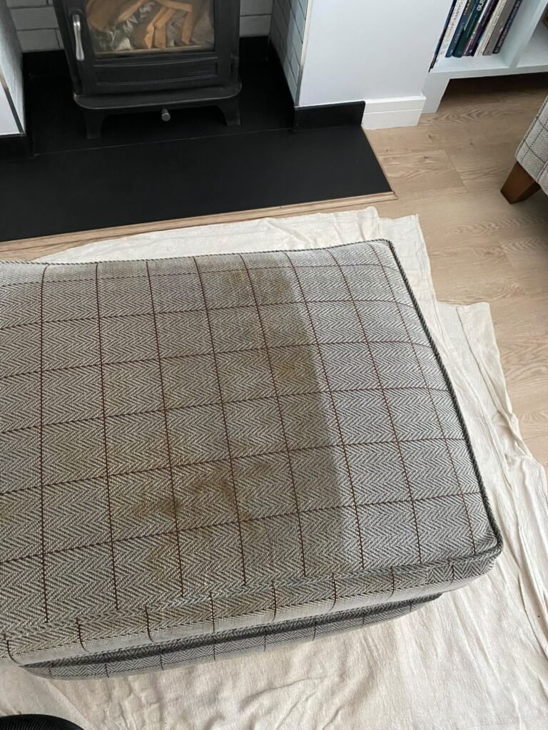 Mattress on dust sheets during mattress cleaning